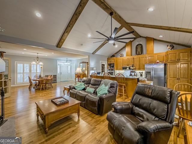 living room with beamed ceiling, ceiling fan, and light hardwood / wood-style flooring