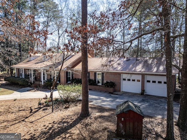 ranch-style home with a garage