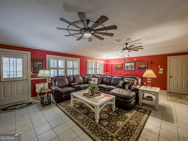 living room with light tile patterned floors and ceiling fan