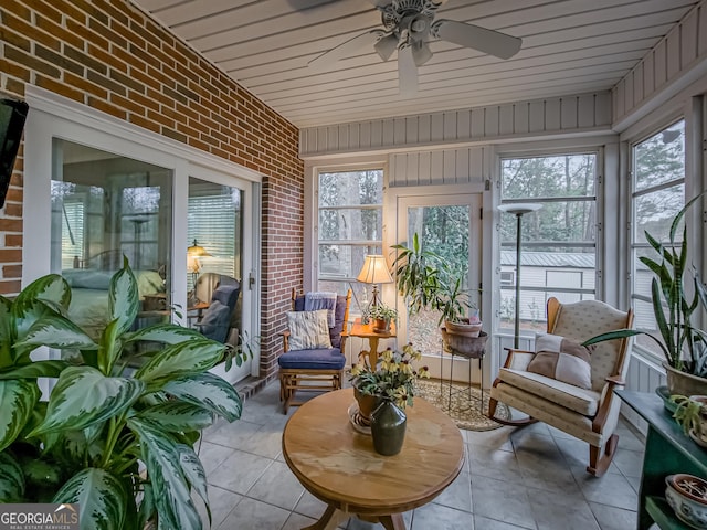 sunroom / solarium with ceiling fan