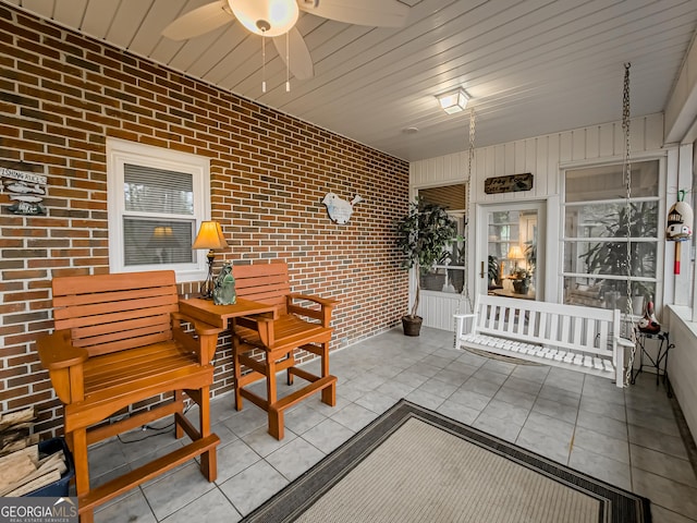 view of patio / terrace featuring ceiling fan