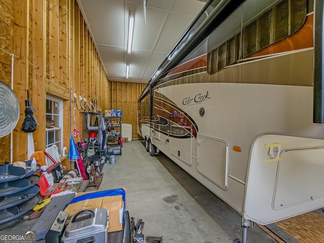 garage with wood walls