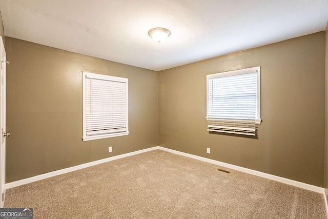 view of carpeted spare room