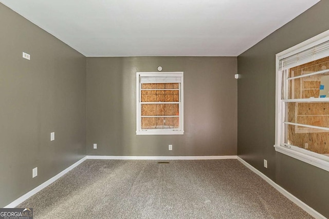 view of carpeted spare room