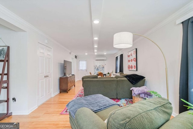 living room featuring crown molding, wood-type flooring, and an AC wall unit