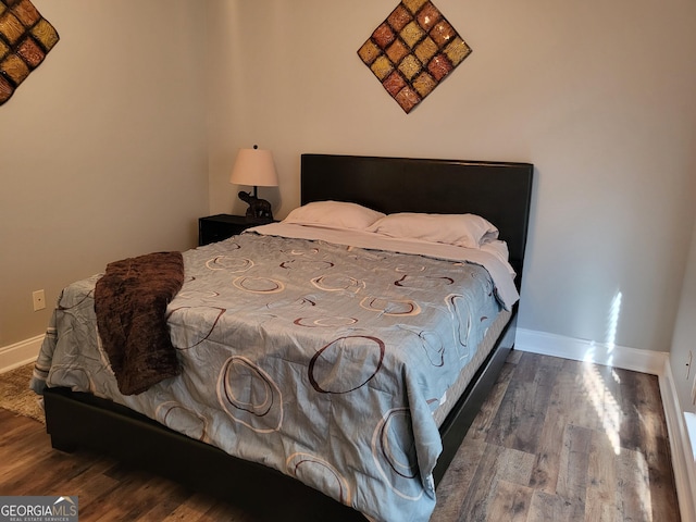 bedroom featuring hardwood / wood-style floors