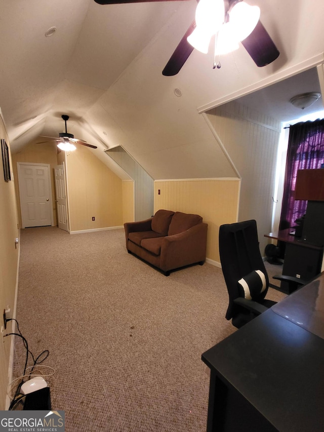 carpeted office featuring ceiling fan and lofted ceiling