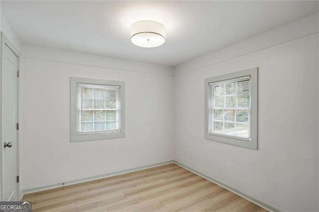 empty room featuring light hardwood / wood-style floors