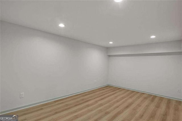 unfurnished room featuring light hardwood / wood-style floors