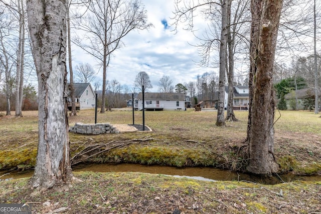 view of yard featuring a water view