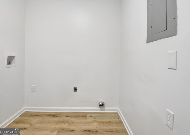 washroom with hardwood / wood-style floors, electric dryer hookup, washer hookup, and electric panel