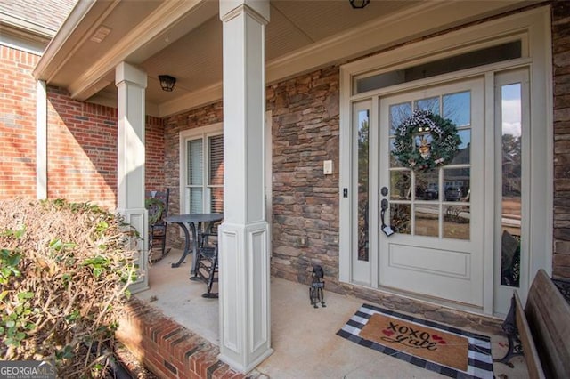 entrance to property with covered porch