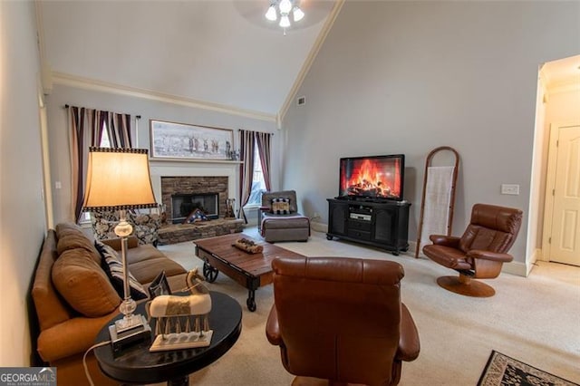 carpeted living room with ceiling fan, ornamental molding, a fireplace, and high vaulted ceiling