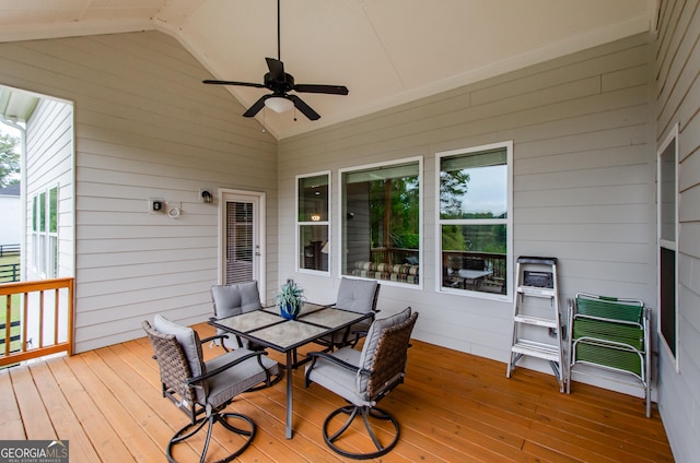 wooden terrace featuring ceiling fan