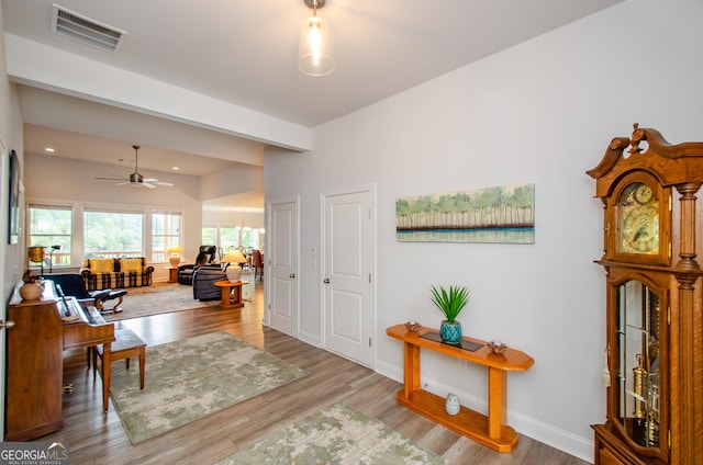 entryway featuring ceiling fan and light hardwood / wood-style floors