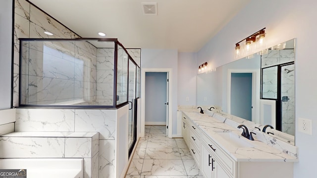 bathroom featuring a marble finish shower, double vanity, a bathing tub, marble finish floor, and a sink