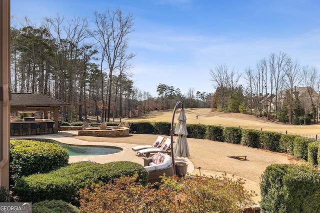 surrounding community with a patio, a gazebo, a pool, and a bar