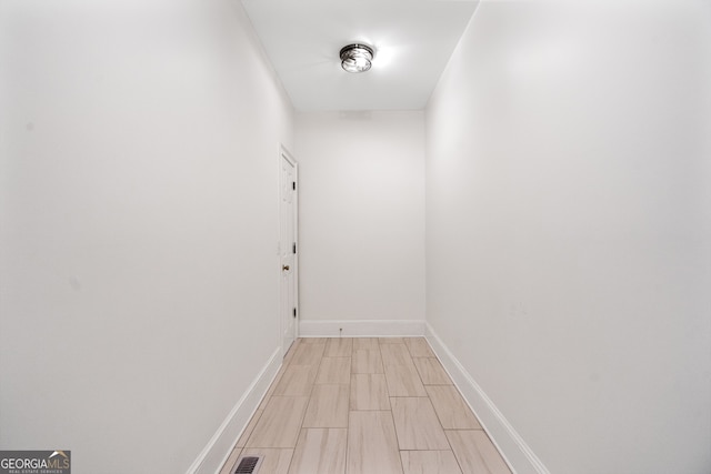 corridor with baseboards