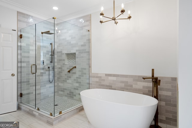 full bath with recessed lighting, tile walls, ornamental molding, a soaking tub, and a stall shower