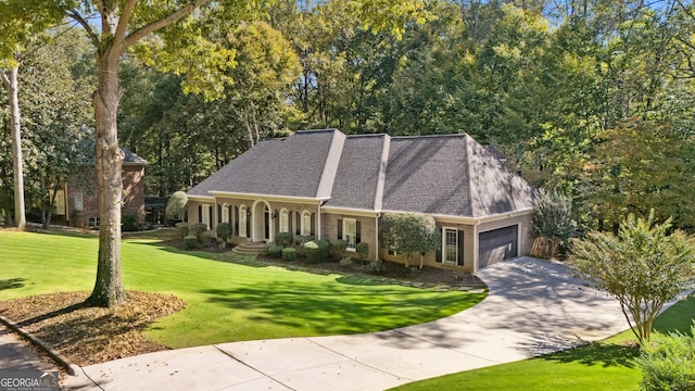 view of front of house with a garage, covered porch, brick siding, concrete driveway, and a front lawn