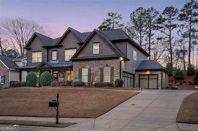 view of front of property with a garage