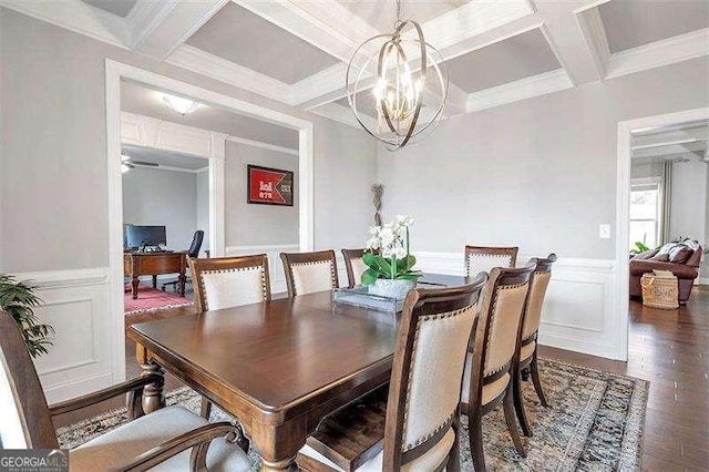 dining area with coffered ceiling, dark hardwood / wood-style floors, beam ceiling, and a chandelier