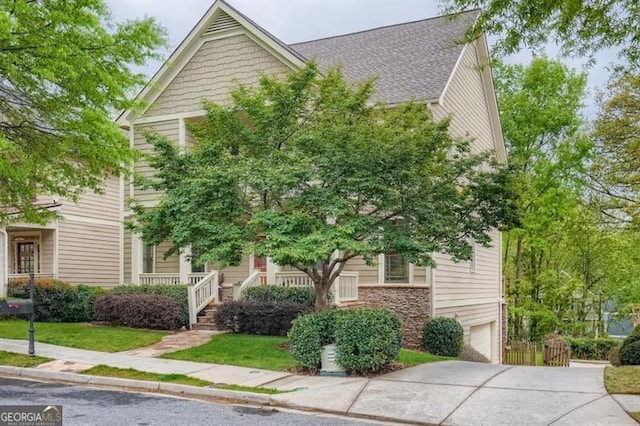 view of front of property featuring a garage