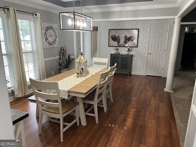 dining space with ornamental molding, dark wood-style flooring, baseboards, and wallpapered walls