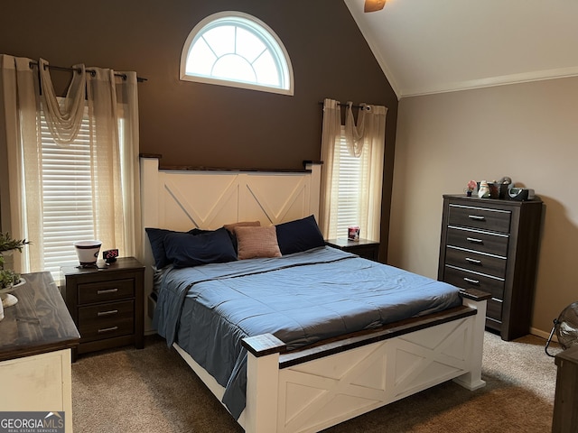 bedroom with high vaulted ceiling, carpet flooring, and crown molding