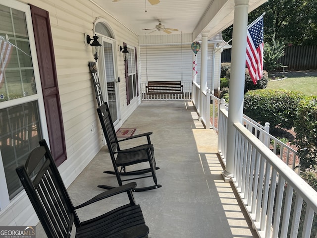 view of patio with a porch and a ceiling fan