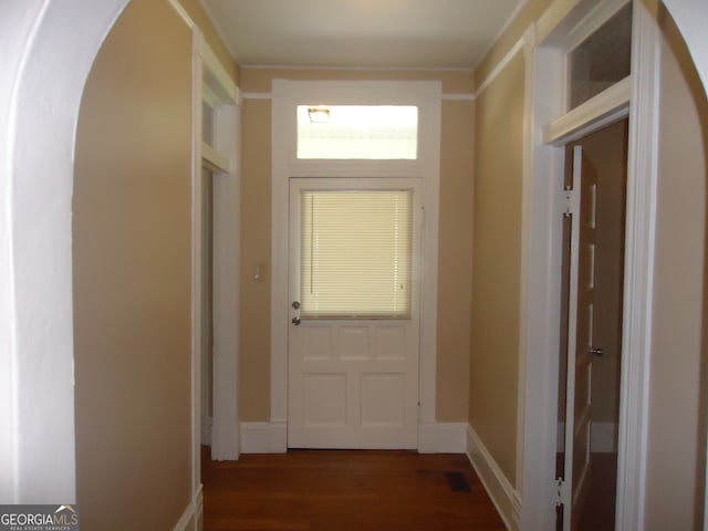 doorway to outside featuring dark hardwood / wood-style flooring