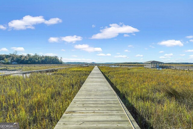 view of dock featuring a rural view