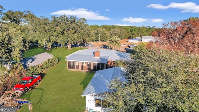 aerial view featuring a forest view