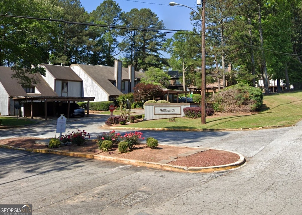 view of community featuring a yard