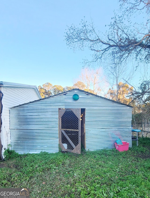 view of outbuilding featuring a trampoline