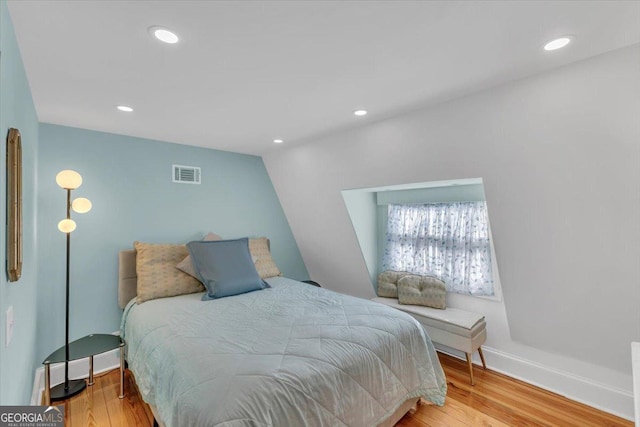 bedroom featuring wood-type flooring