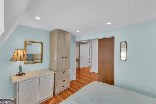 bedroom featuring light hardwood / wood-style floors