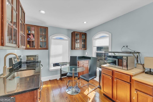 kitchen featuring sink and light wood-type flooring