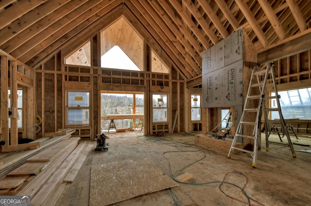 misc room with high vaulted ceiling