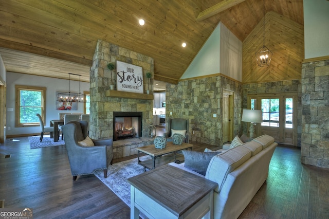 living room with dark hardwood / wood-style flooring, wood ceiling, and a chandelier