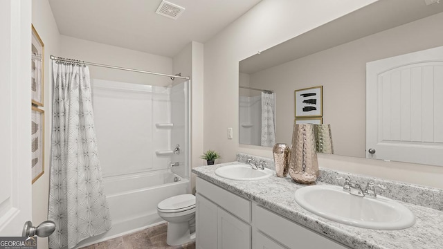 full bathroom featuring vanity, toilet, and shower / bath combo