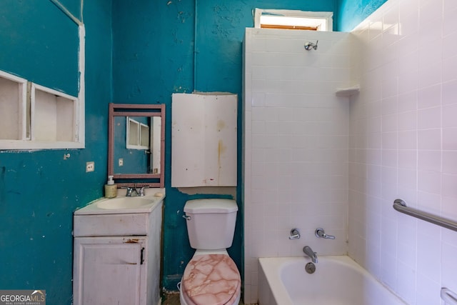 full bathroom featuring toilet, vanity, and  shower combination