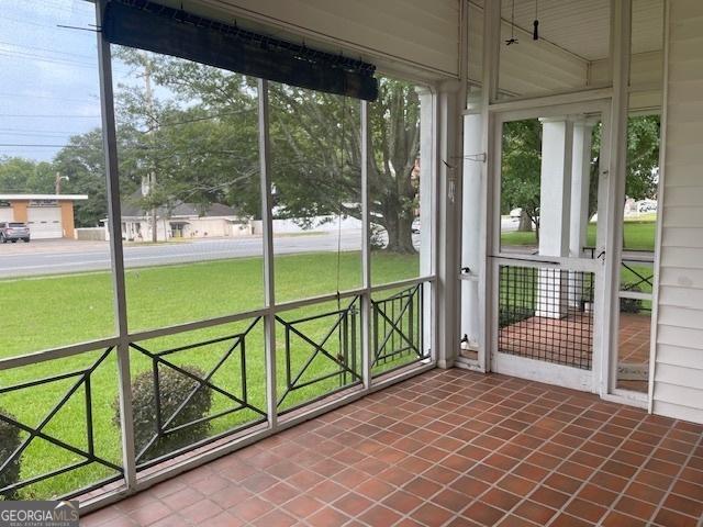 view of unfurnished sunroom