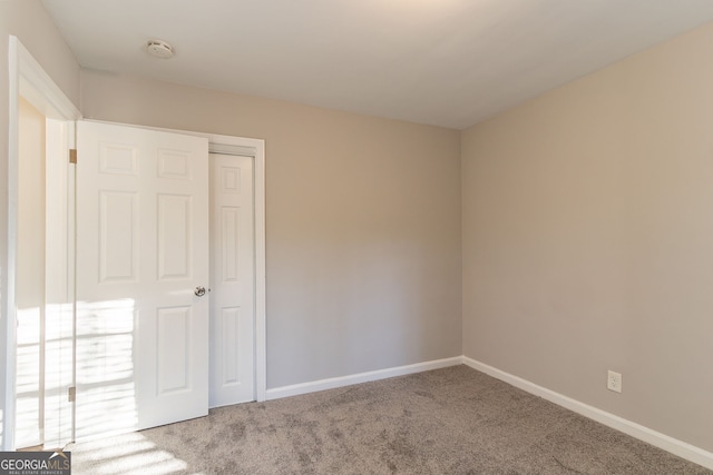 empty room featuring carpet