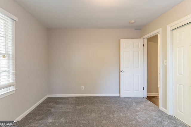 empty room featuring carpet