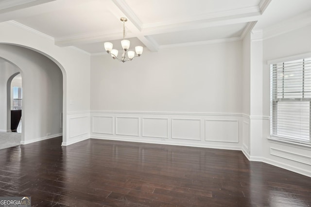 empty room with dark wood-style floors, beamed ceiling, arched walkways, and an inviting chandelier