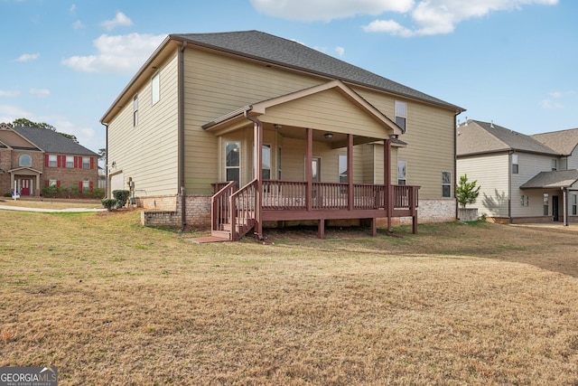 view of front of home featuring brick siding and a front yard