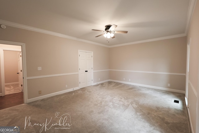 4804 Brittany Dr, Macon, GA 31210 - unfurnished room featuring ceiling fan, carpet flooring, ornamental molding, and a smoke detector