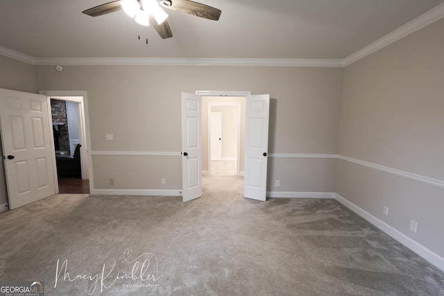 4804 Brittany Dr, Macon, GA 31210 - unfurnished bedroom with carpet, ornamental molding, and a ceiling fan