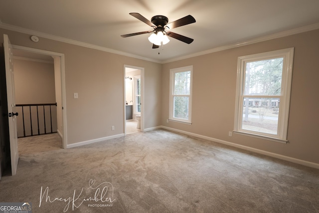 4804 Brittany Dr, Macon, GA 31210 - carpeted spare room with crown molding, a ceiling fan, and a smoke detector